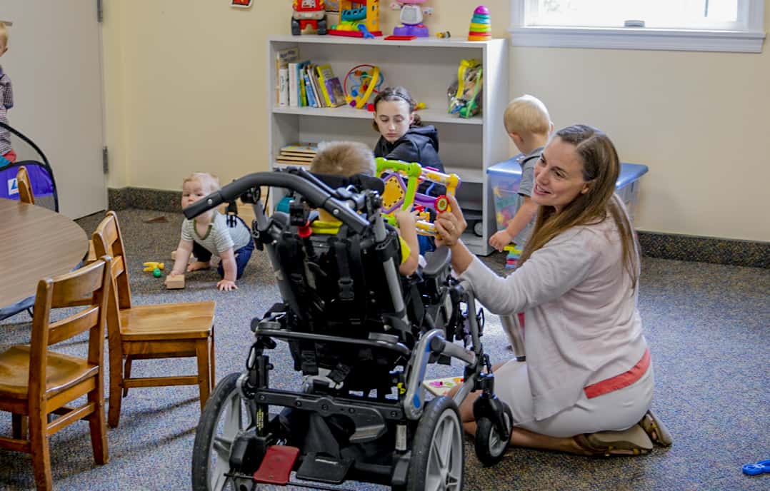 volunteers working with children